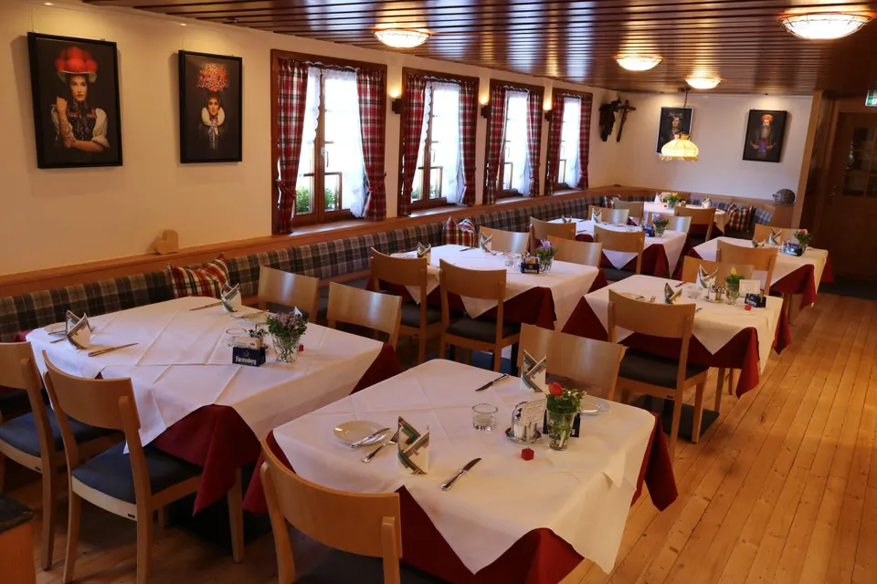 The main dining room, laid for dinner