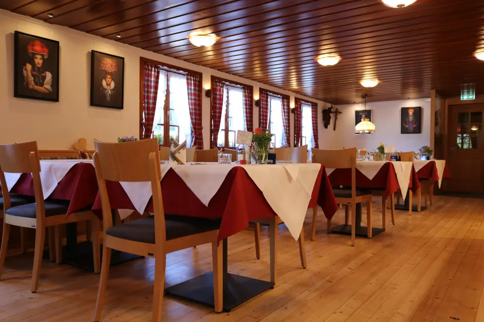 Dining room with Black Forest portraits