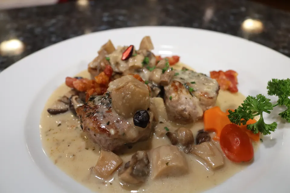 Pork tenderloin in cream mushroom sauce